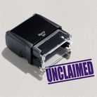 Self-inking pre-designed stamp unclaimed text 